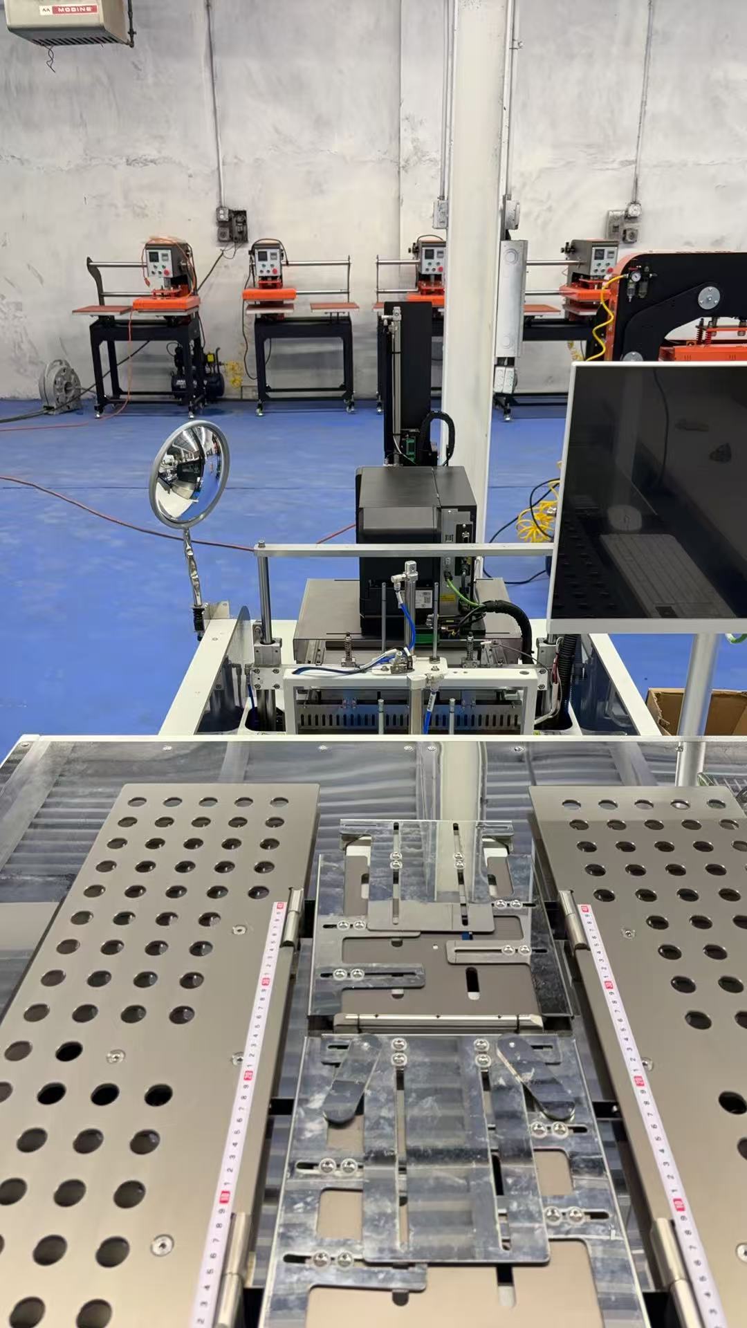Actual GLOBE POD conveyor workbed and heat-press stations